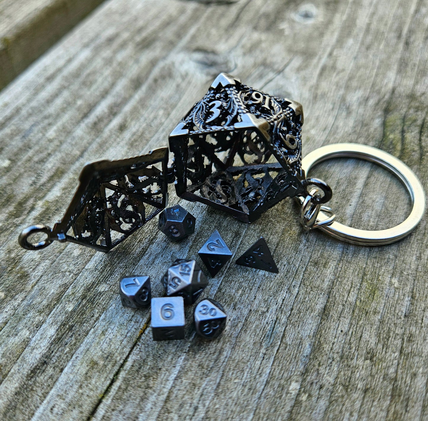 Metal d20 keychain with matching dice