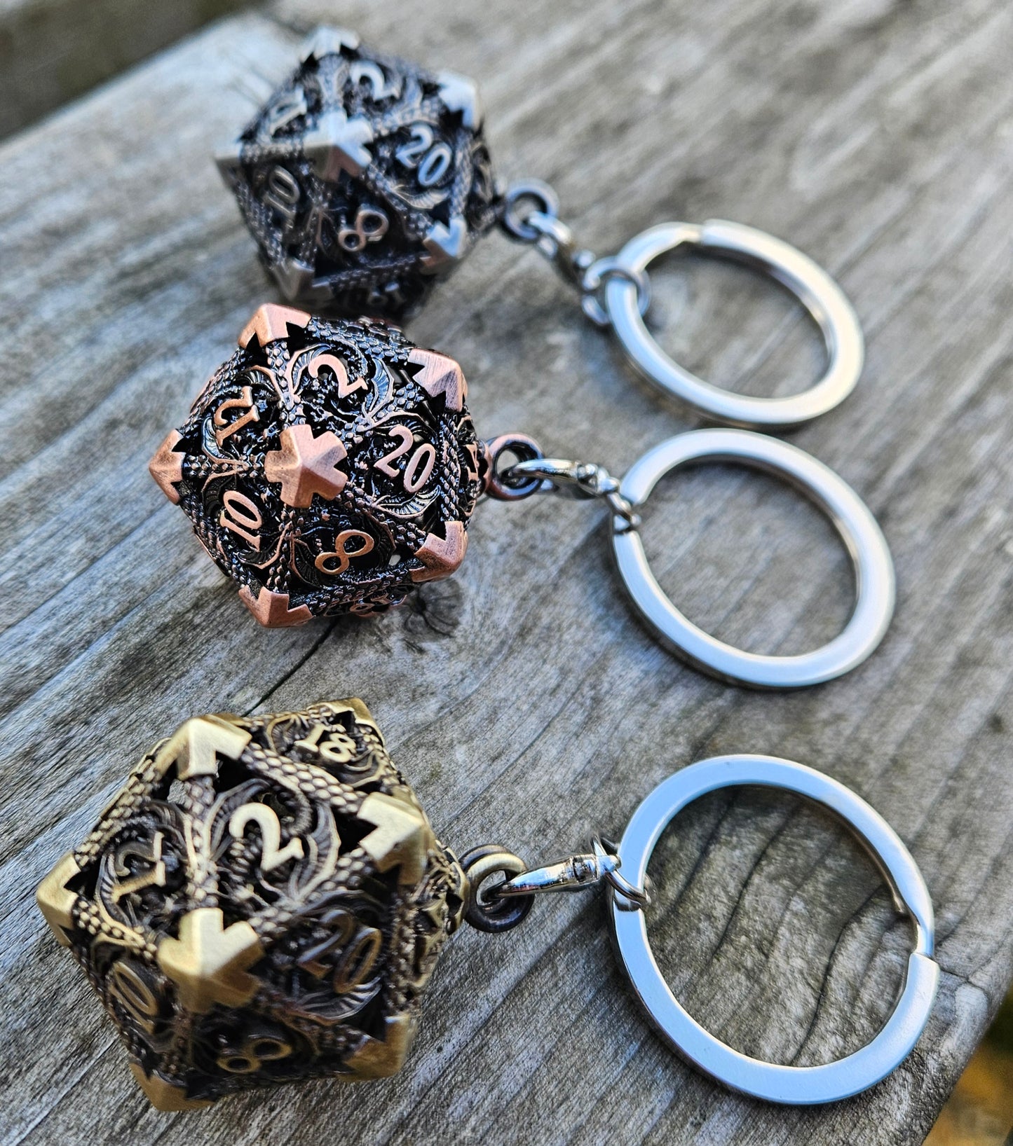 Metal d20 keychain with matching dice