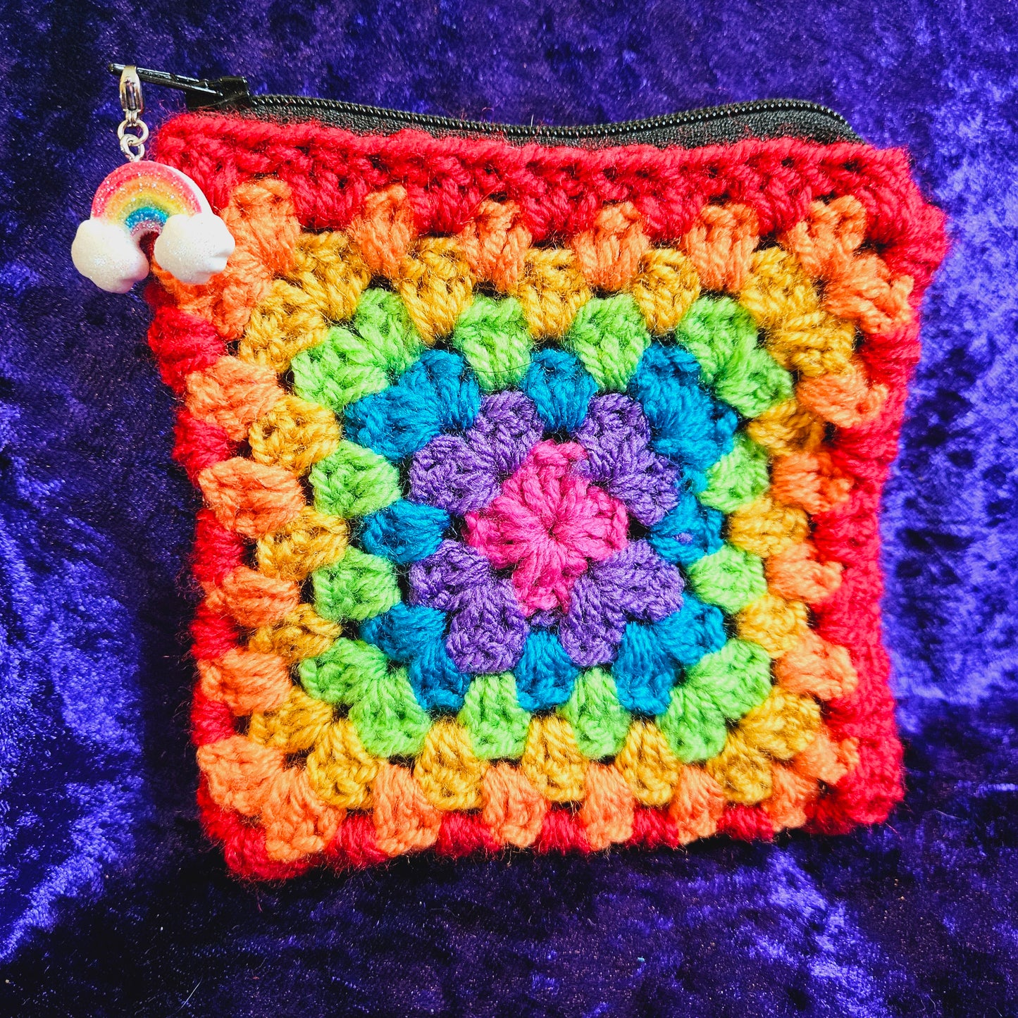 Handmade rainbow crochet dice pouch