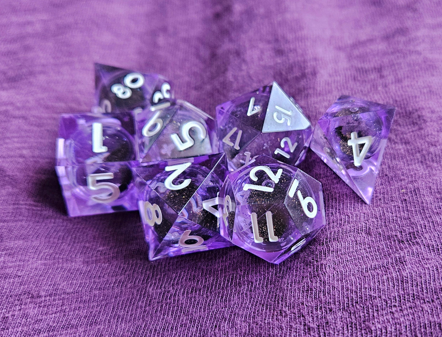 Liquid core purple dice