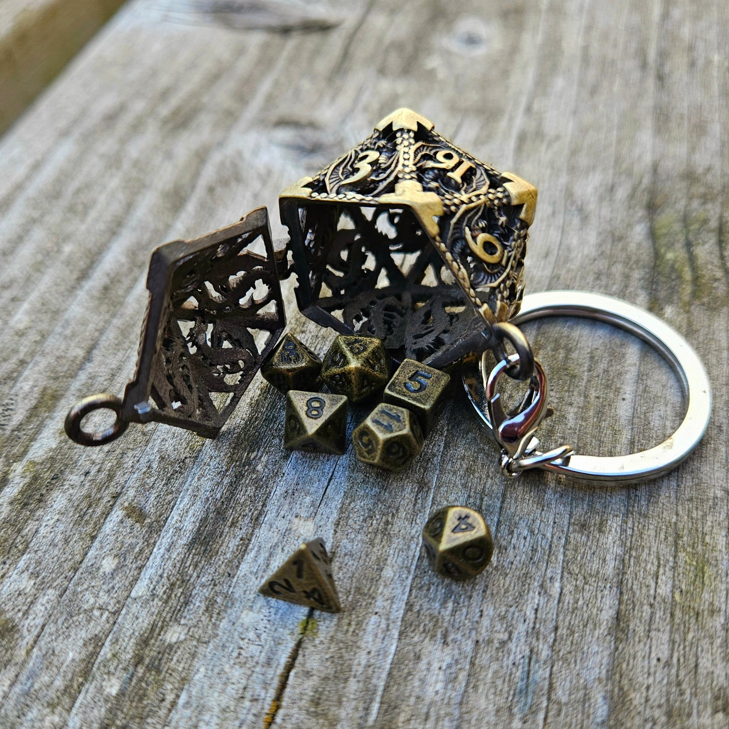 Metal d20 keychain with matching dice