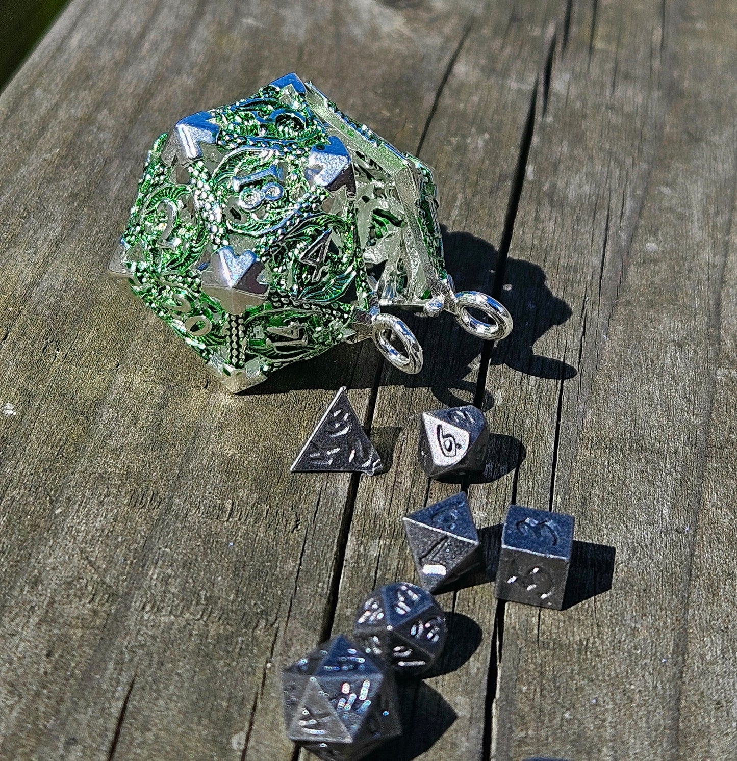 Metal d20 keychain with matching dice