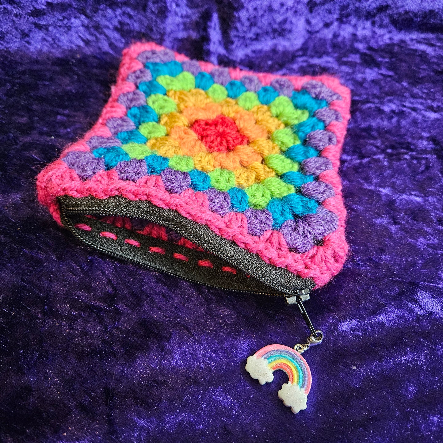 Handmade rainbow crochet dice pouch