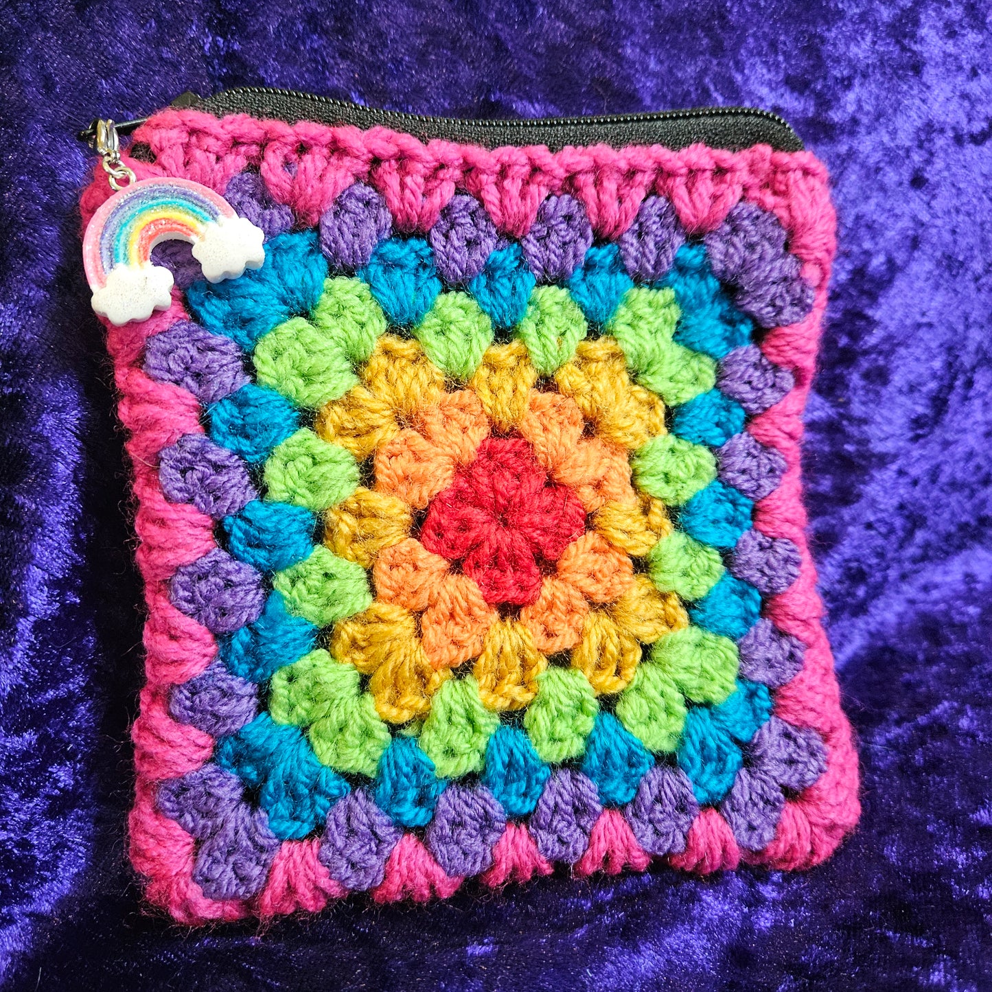 Handmade rainbow crochet dice pouch